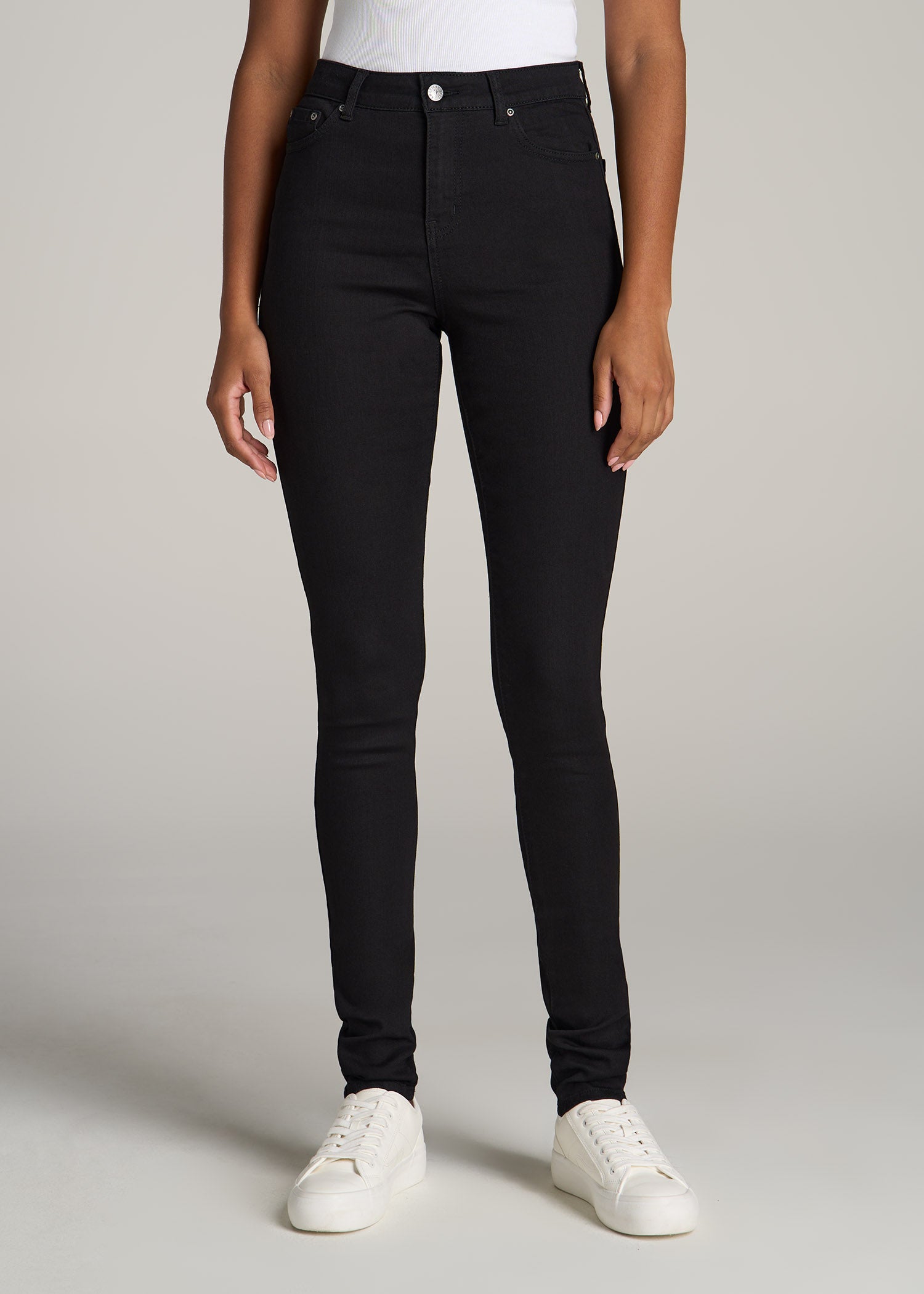 Women's Classic Faded Out Skinny Jeggings. • Faux front button