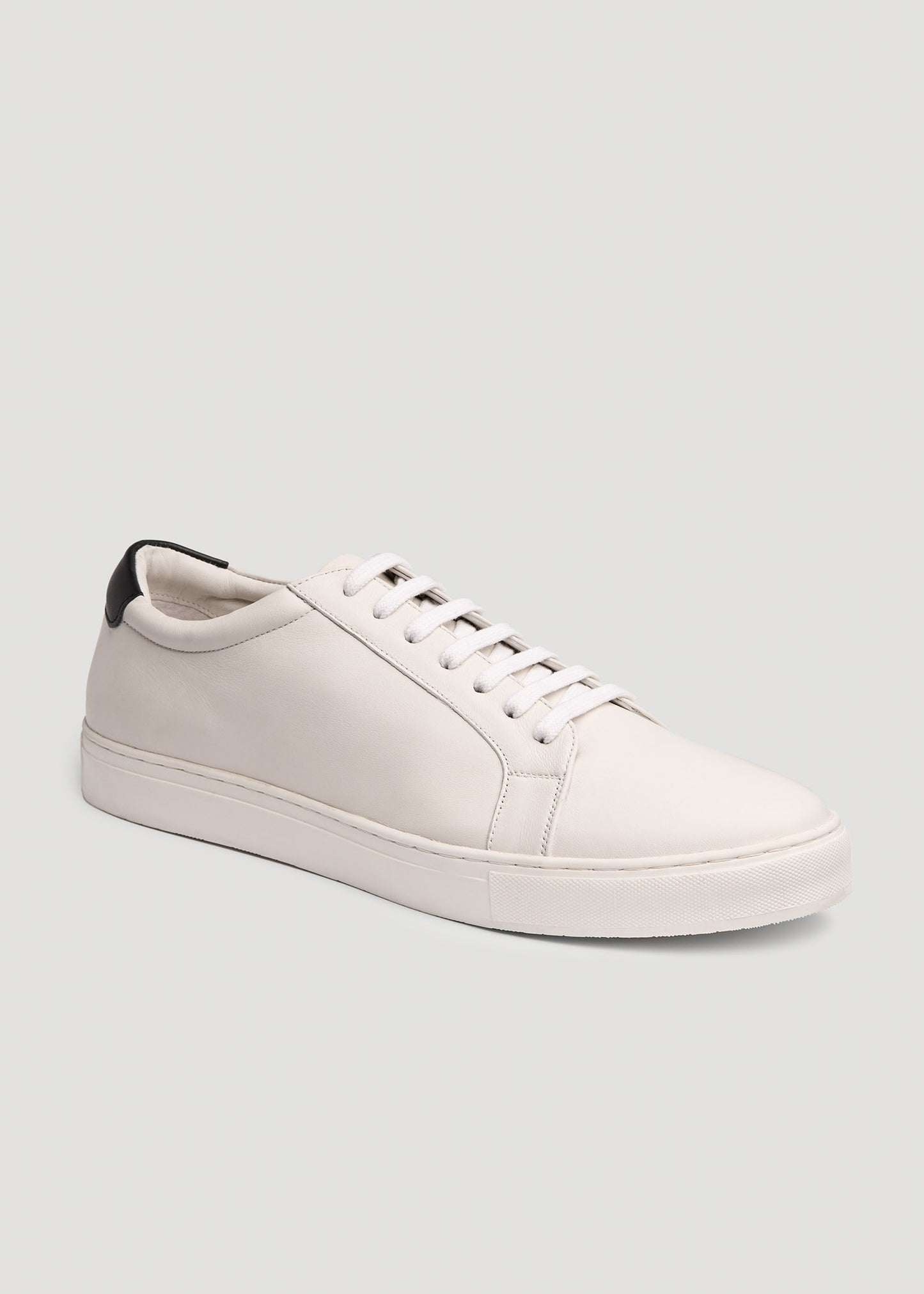 Side view of American Tall's Cupsole Tennis Sneakers for Tall Men in White.