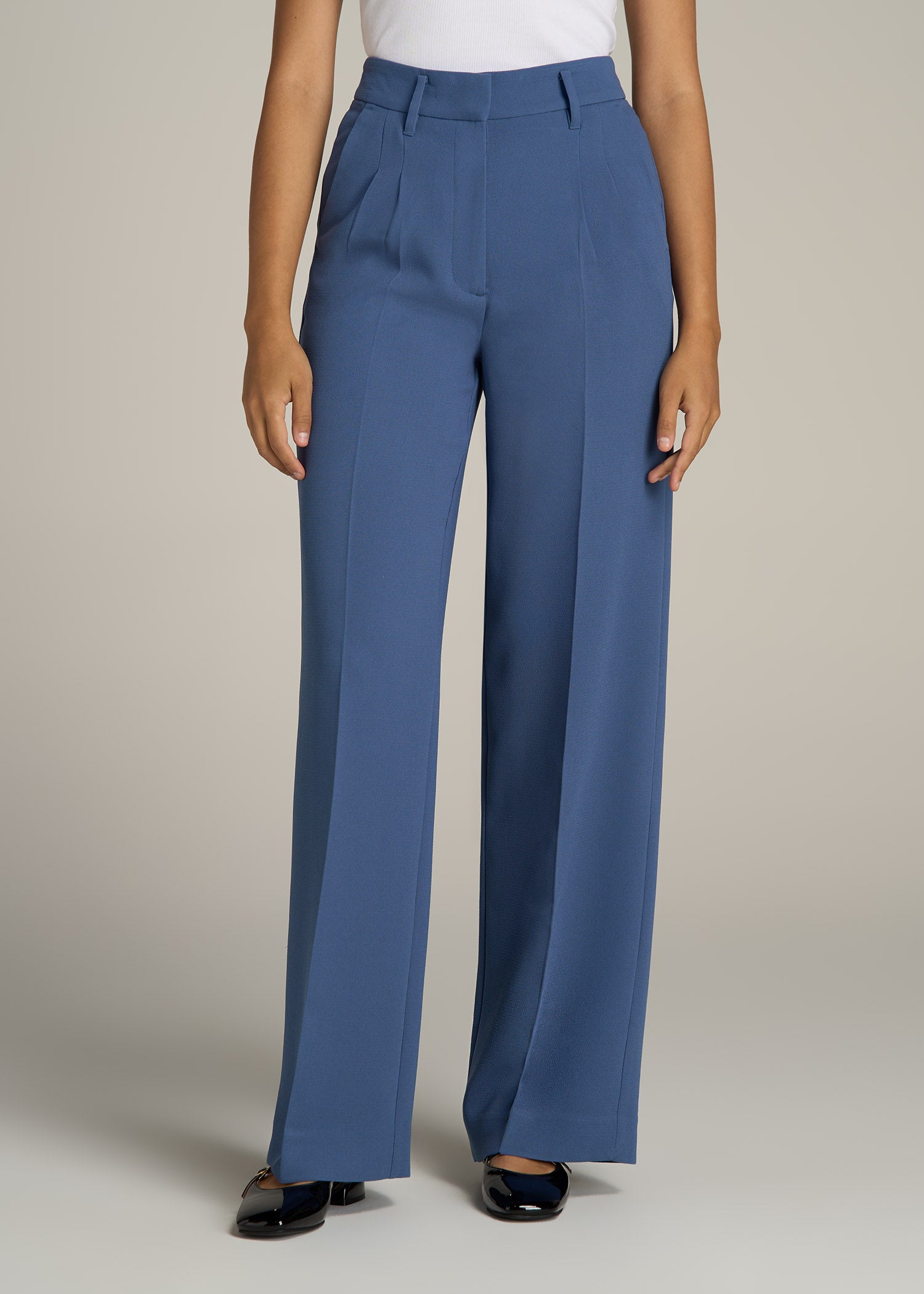 http://americantall.com/cdn/shop/files/American-Tall-Women-Pleated-Dress-Pants-Steel-Blue-front.jpg?v=1695741725