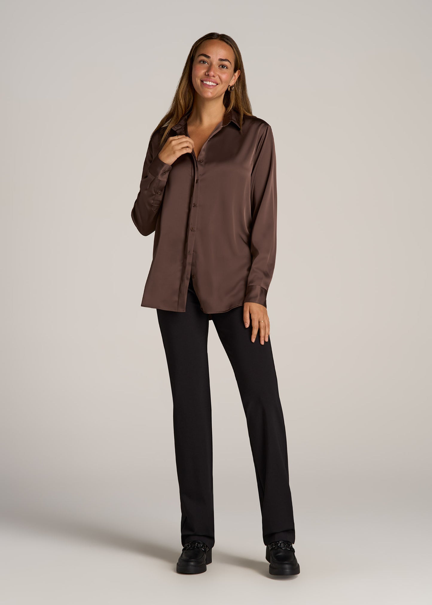 A tall woman wearing American Tall's Relaxed Button Up Tall Women's Blouse in Chocolate Mocha.