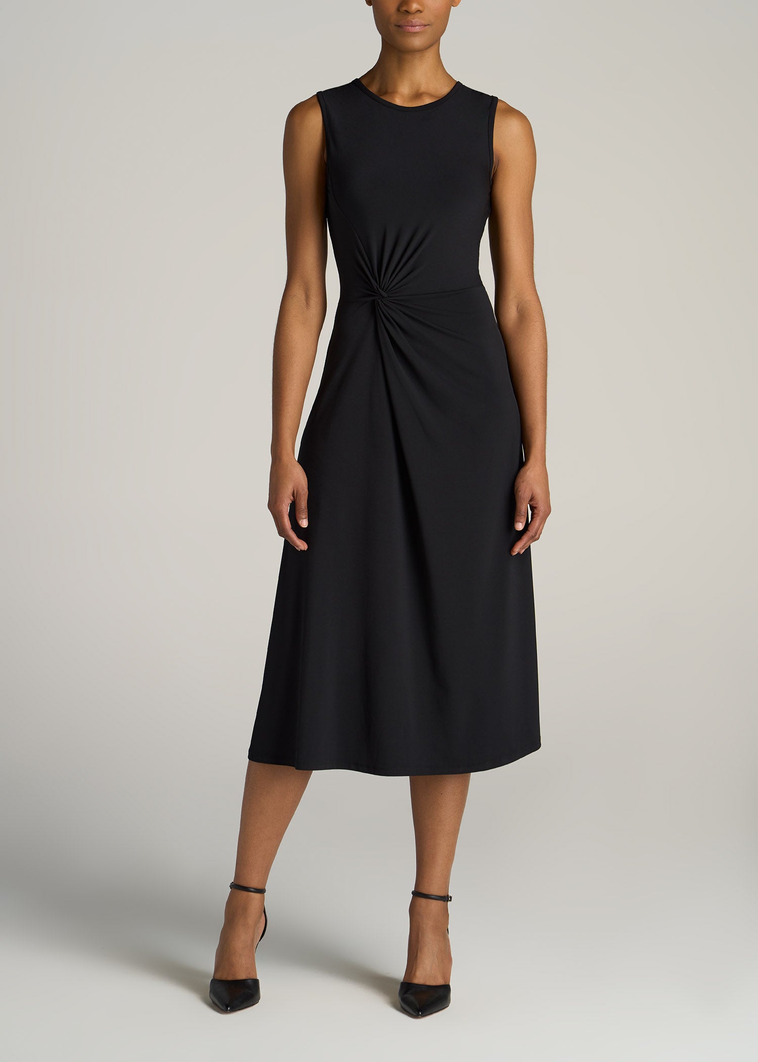 http://americantall.com/cdn/shop/products/American-Tall-Women-Sleeveless-Knot-Front-Dress-Black-front.jpg?v=1674145696