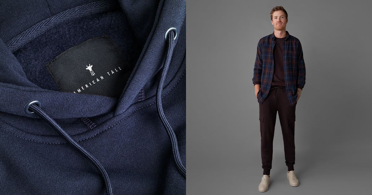 Closeup of tall fleece hoodie by American Tall. Tall man dressed in tall fleece joggers and tall flannel.