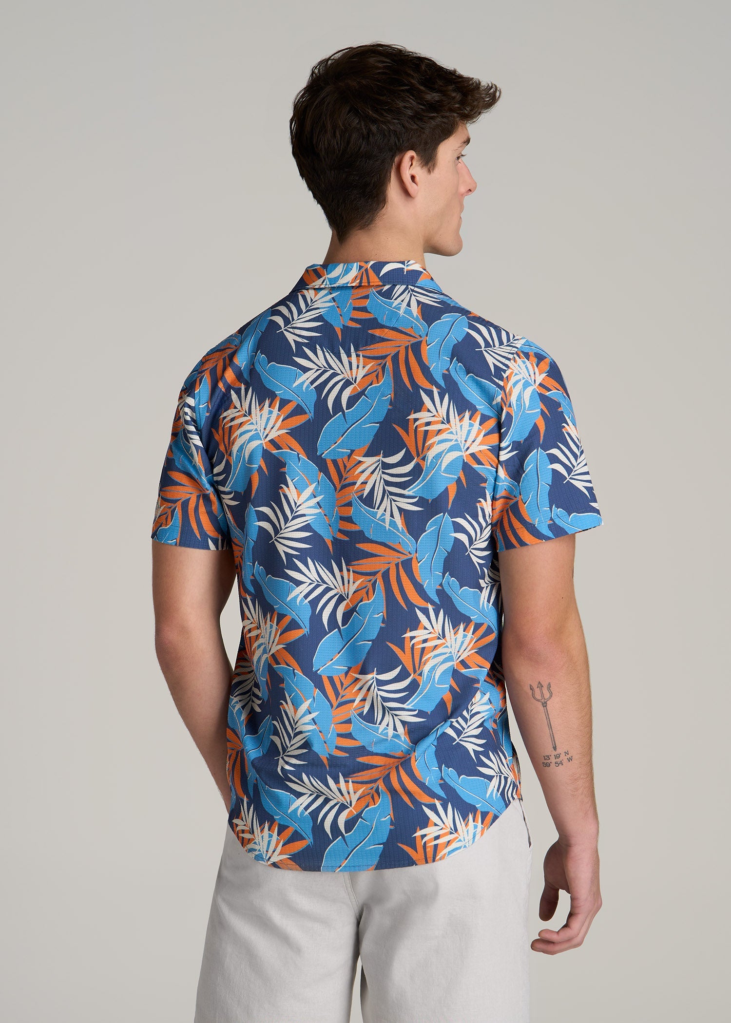 Coastal Perforated Polo Shirt for Tall Men in Blue and Orange Palms