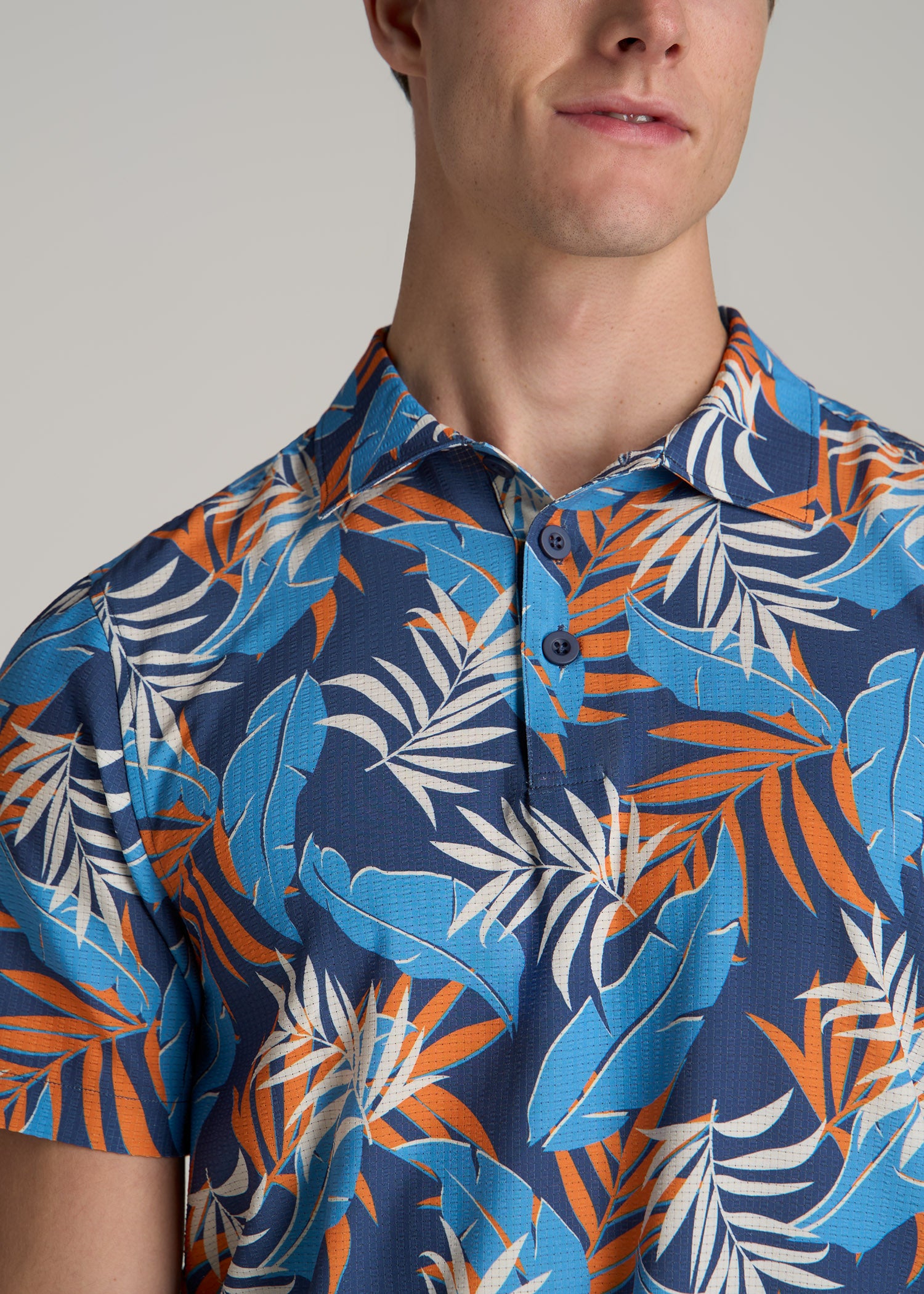 Coastal Perforated Polo Shirt for Tall Men in Blue and Orange Palms