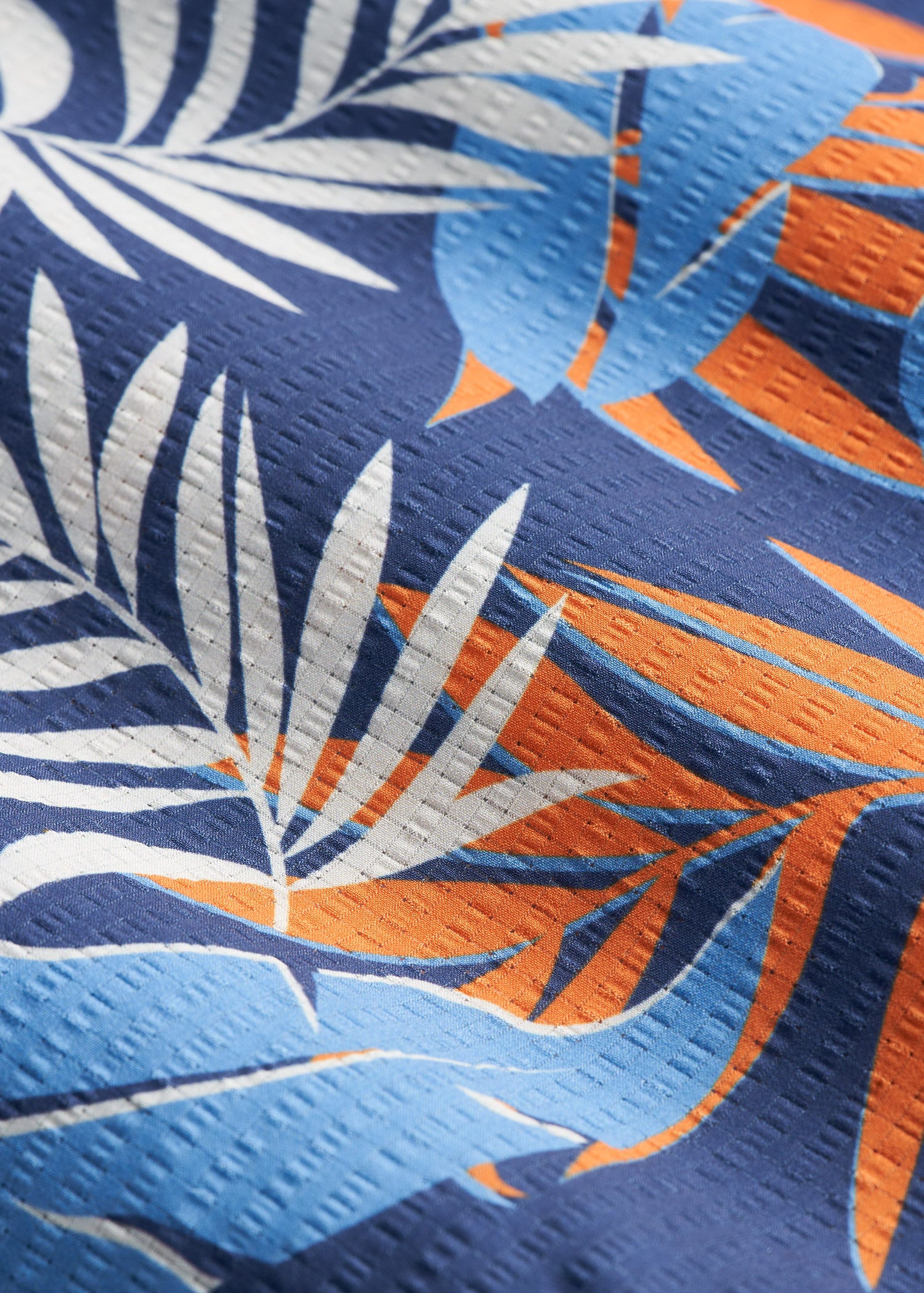 Coastal Perforated Polo Shirt for Tall Men in Blue and Orange Palms