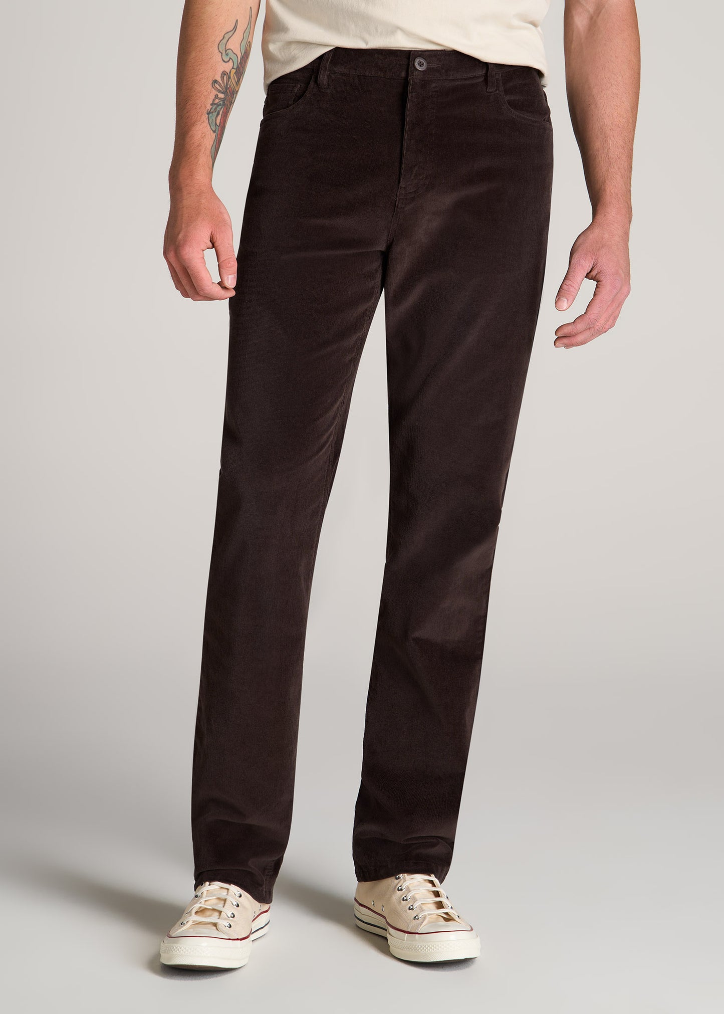 Tall man wearing American Tall's 5 Pocket Stretch Corduroy in Chocolate.