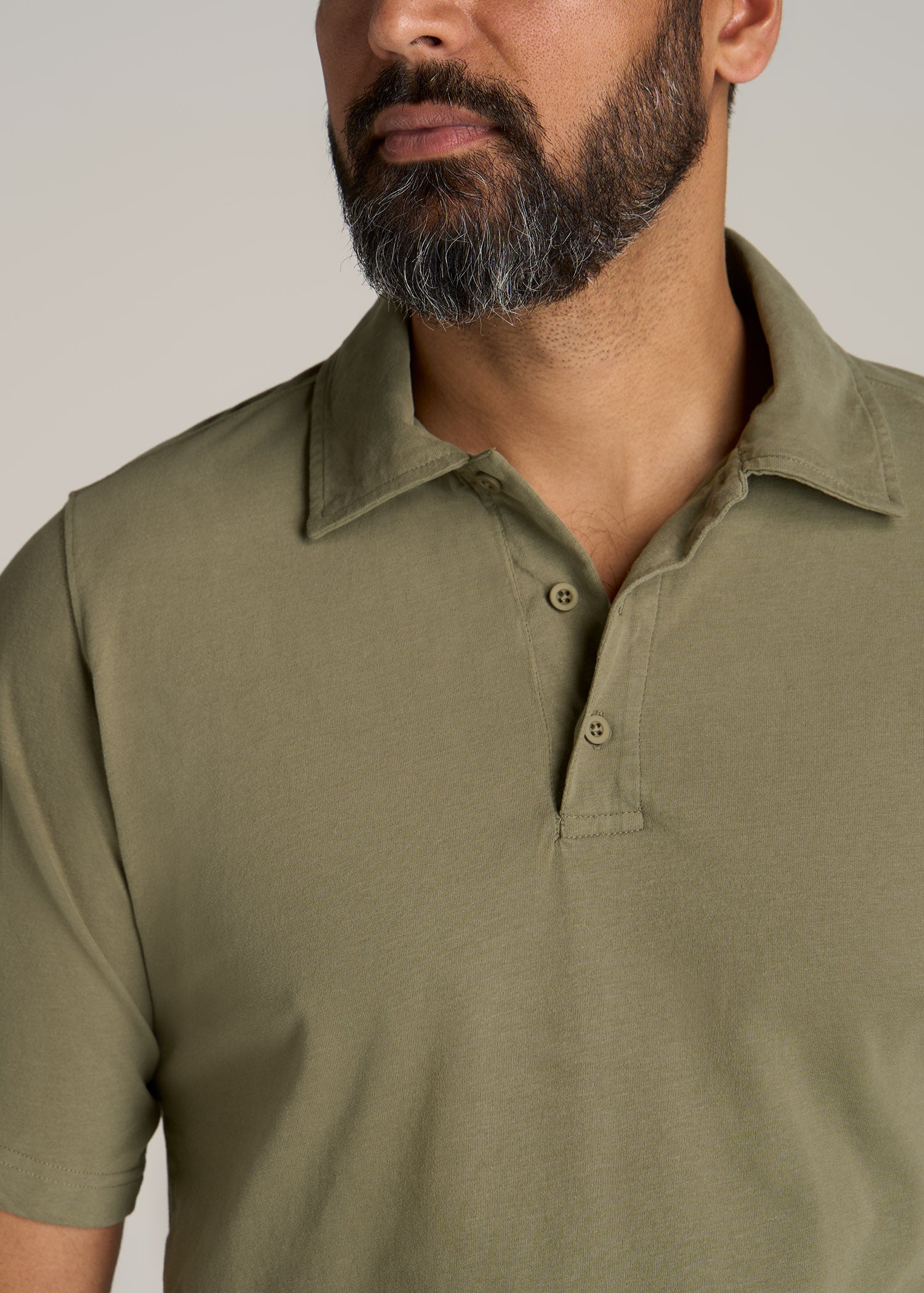 https://americantall.com/cdn/shop/files/American-Tall-Men-Ultra-Soft-Short-Sleeve-Cotton-Polo-Vintage-Moss-Green-detail_1946x.jpg?v=1685025472