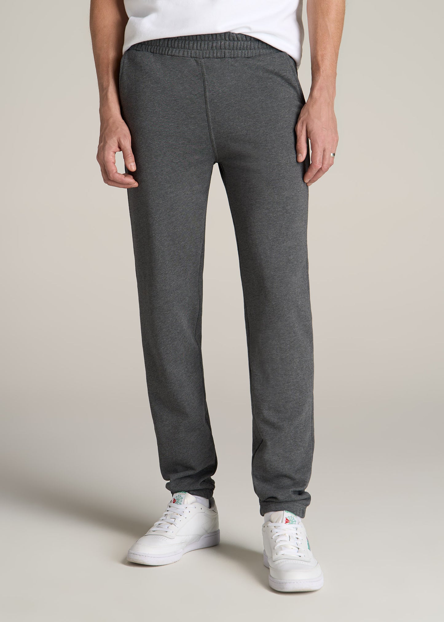 Tall man wearing American Tall's Wearever French Terry Sweatpants in the color Charcoal Mix.