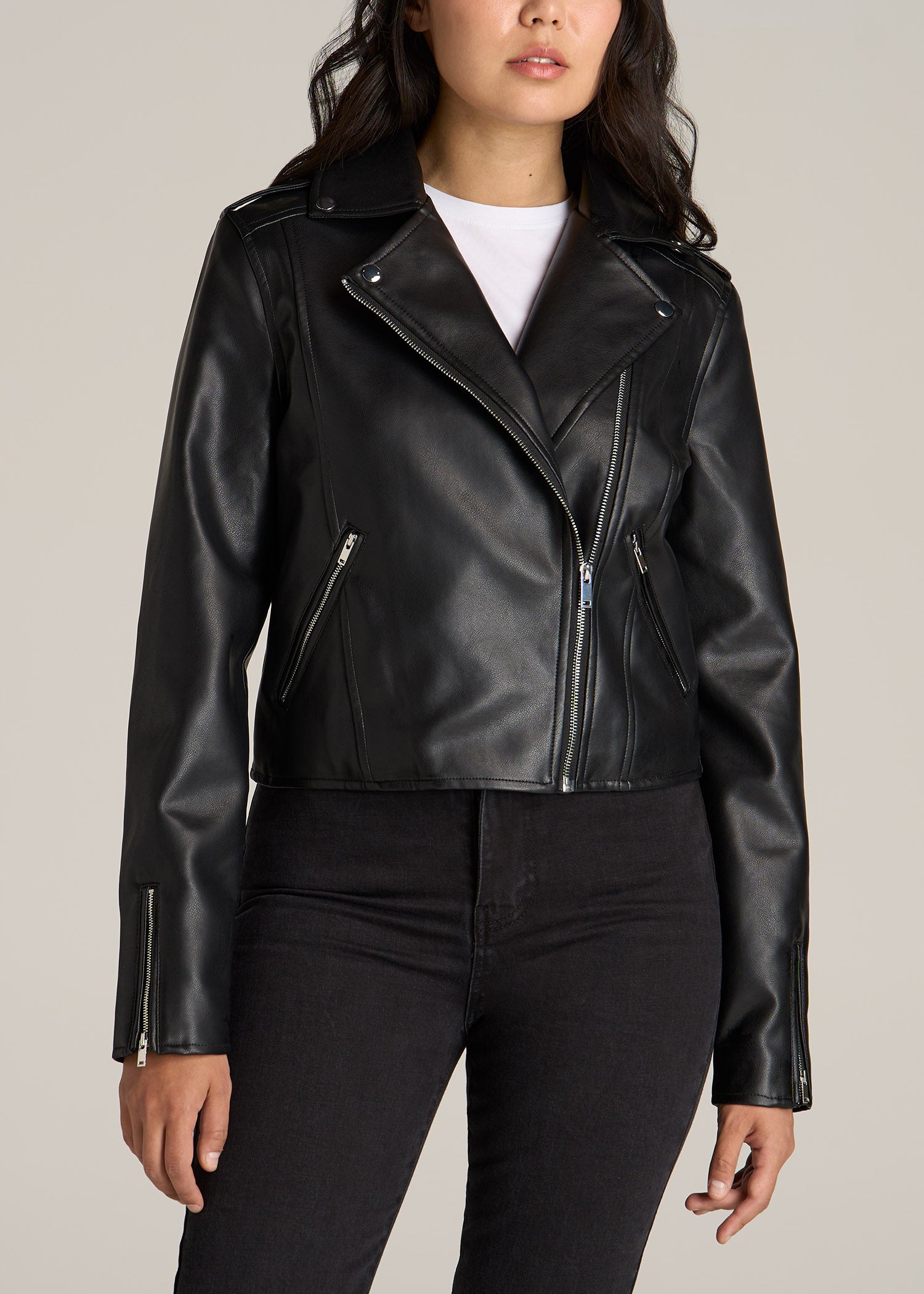 A tall woman wearing American Tall's Faux Leather Moto Jacket for Tall Women in Black.