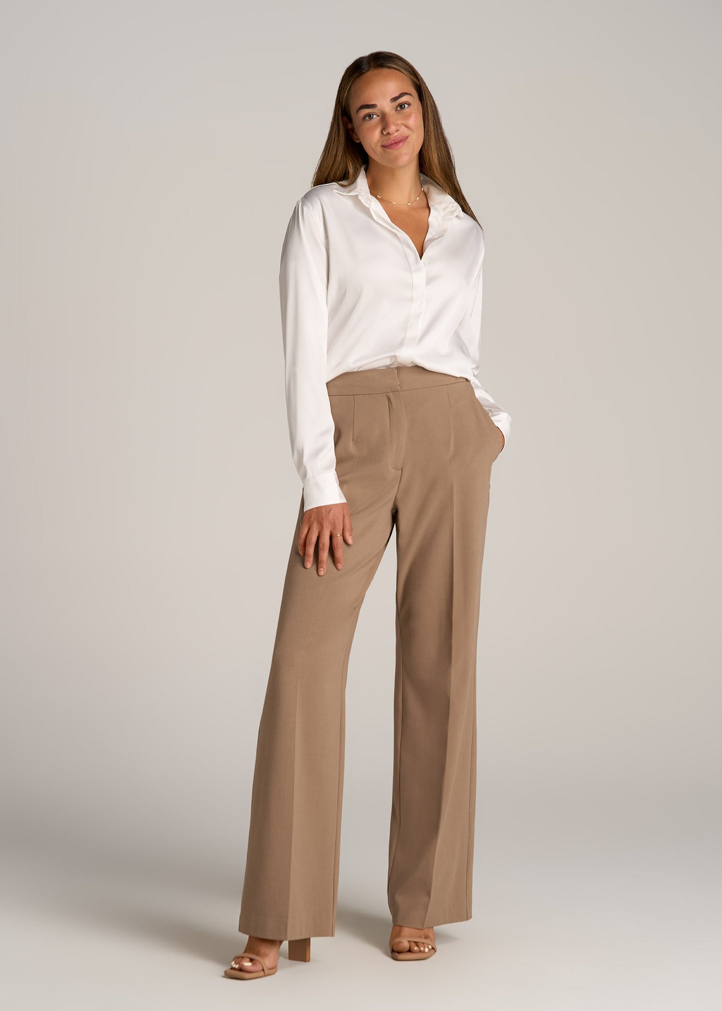 A tall woman wearing Flat Front Wide Leg Dress Pants for Tall Women in Fawn from American Tall