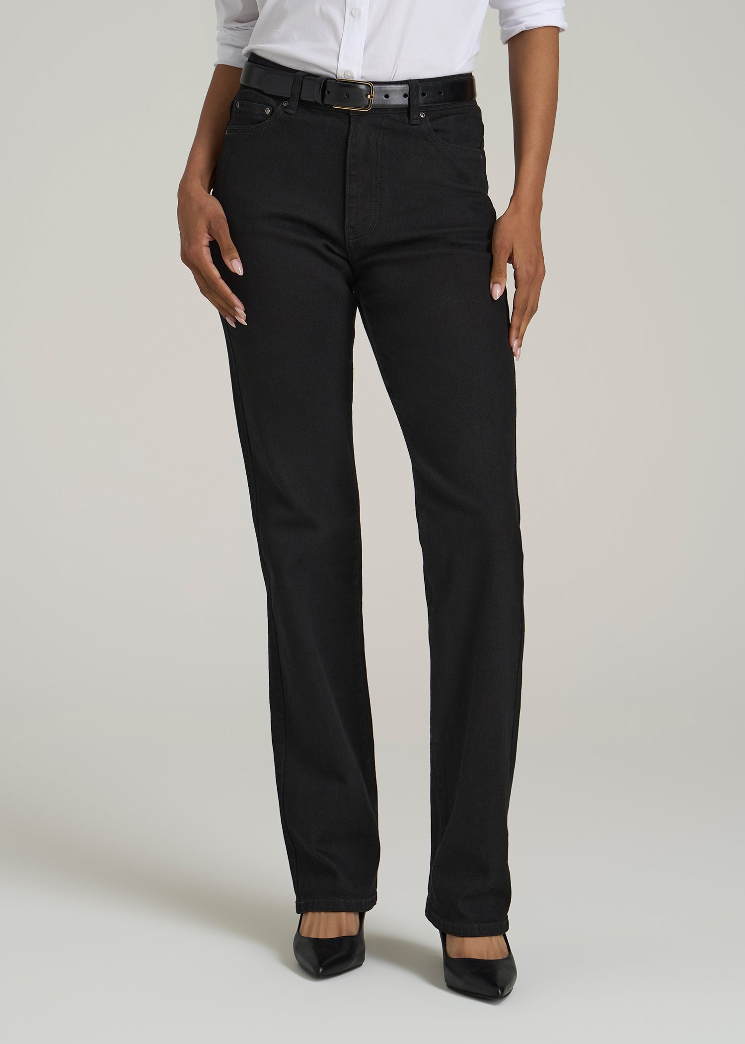 A tall woman wearing American Tall's Harper High-Rise Straight Stretch Jeans for Tall Women