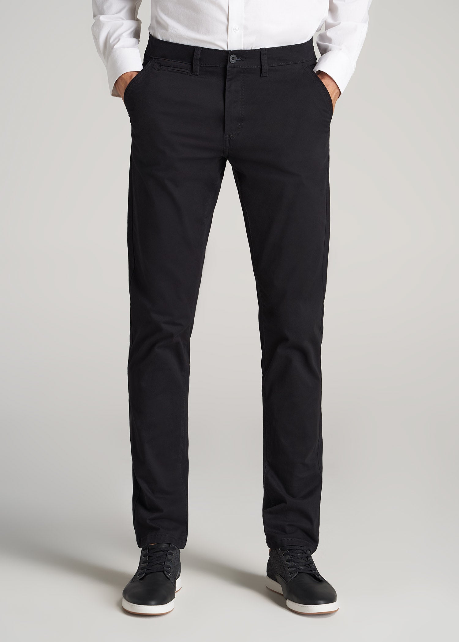 Tall guy wearing American Tall's Tall Carman Tapered Fit Chino Pant in the color Black.