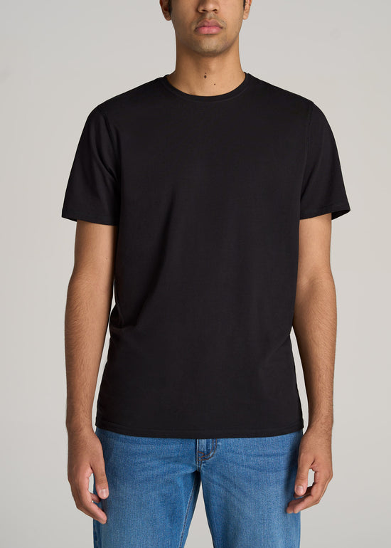 Tall guy wearing American Tall's Essential Regular-Fit Crew-Neck Tee in the color Black.