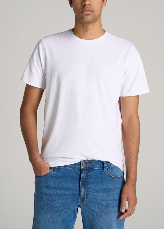 Tall man wearing American Tall's Essential Regular-Fit Crewneck Tee in the color White.