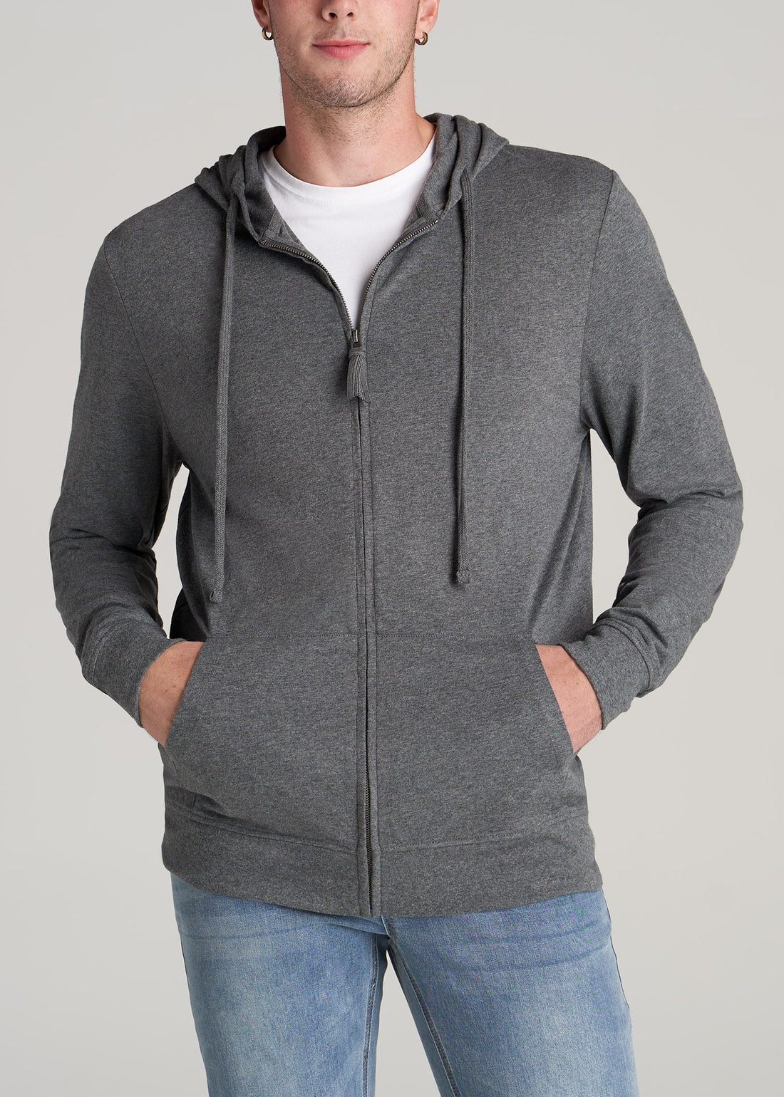 Tall man wearing American Tall's Long Sleeve Full Zip Jersey Hoodie in the color Charcoal Mix.