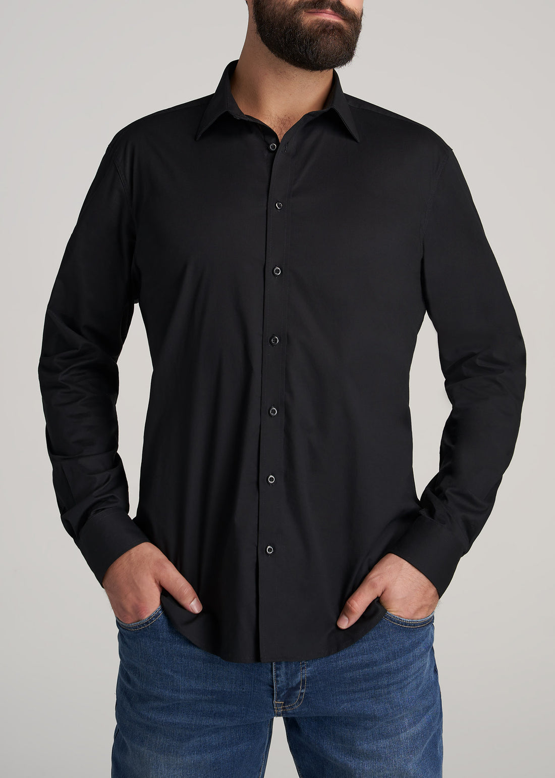 Tall man wearing American Tall's Oskar Easy Care Dress Shirt in the color Black.