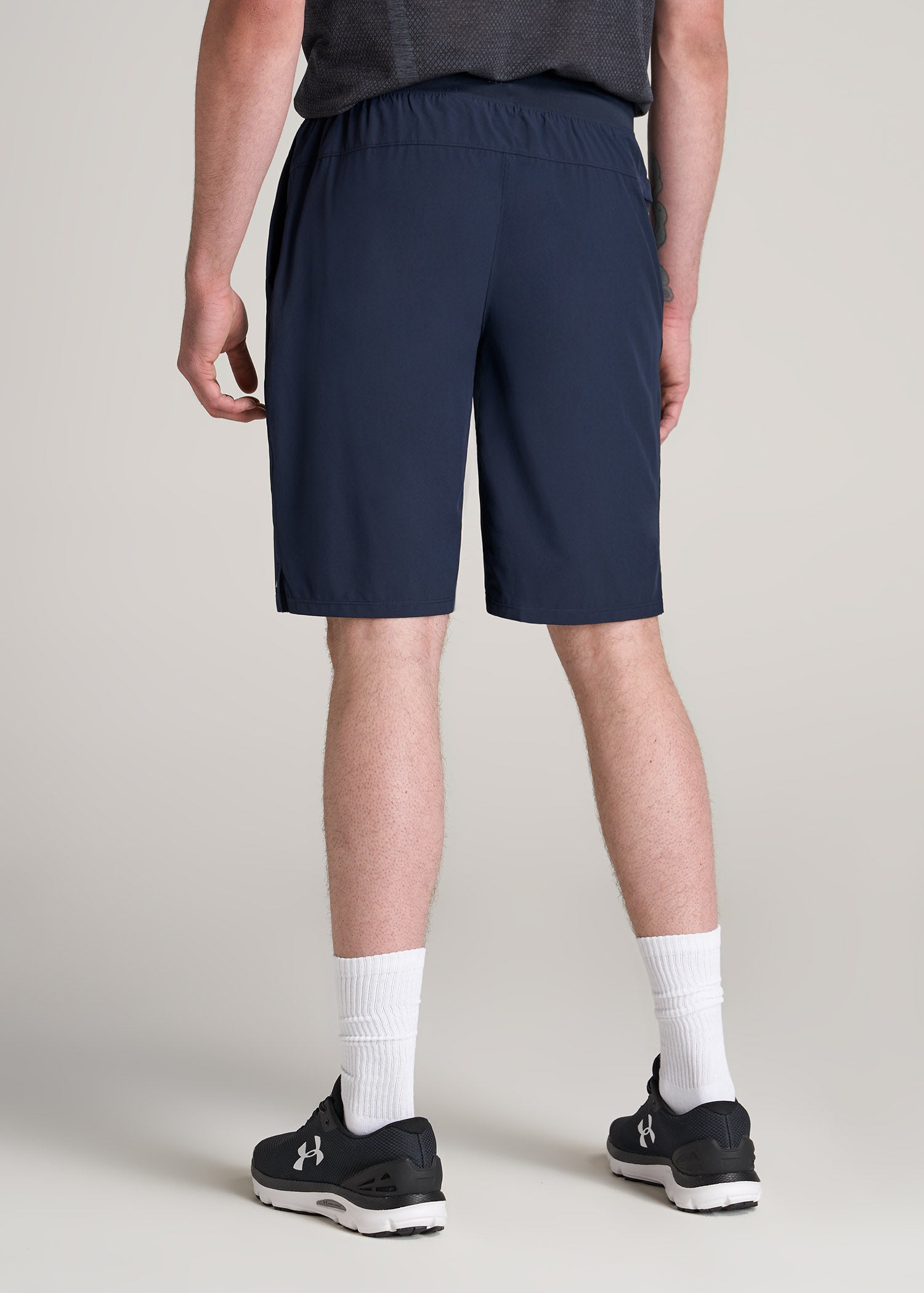 https://americantall.com/cdn/shop/products/American-Tall-Men-Performance-Stretch-Woven-Shorts-Navy-back_1946x.jpg?v=1658434536