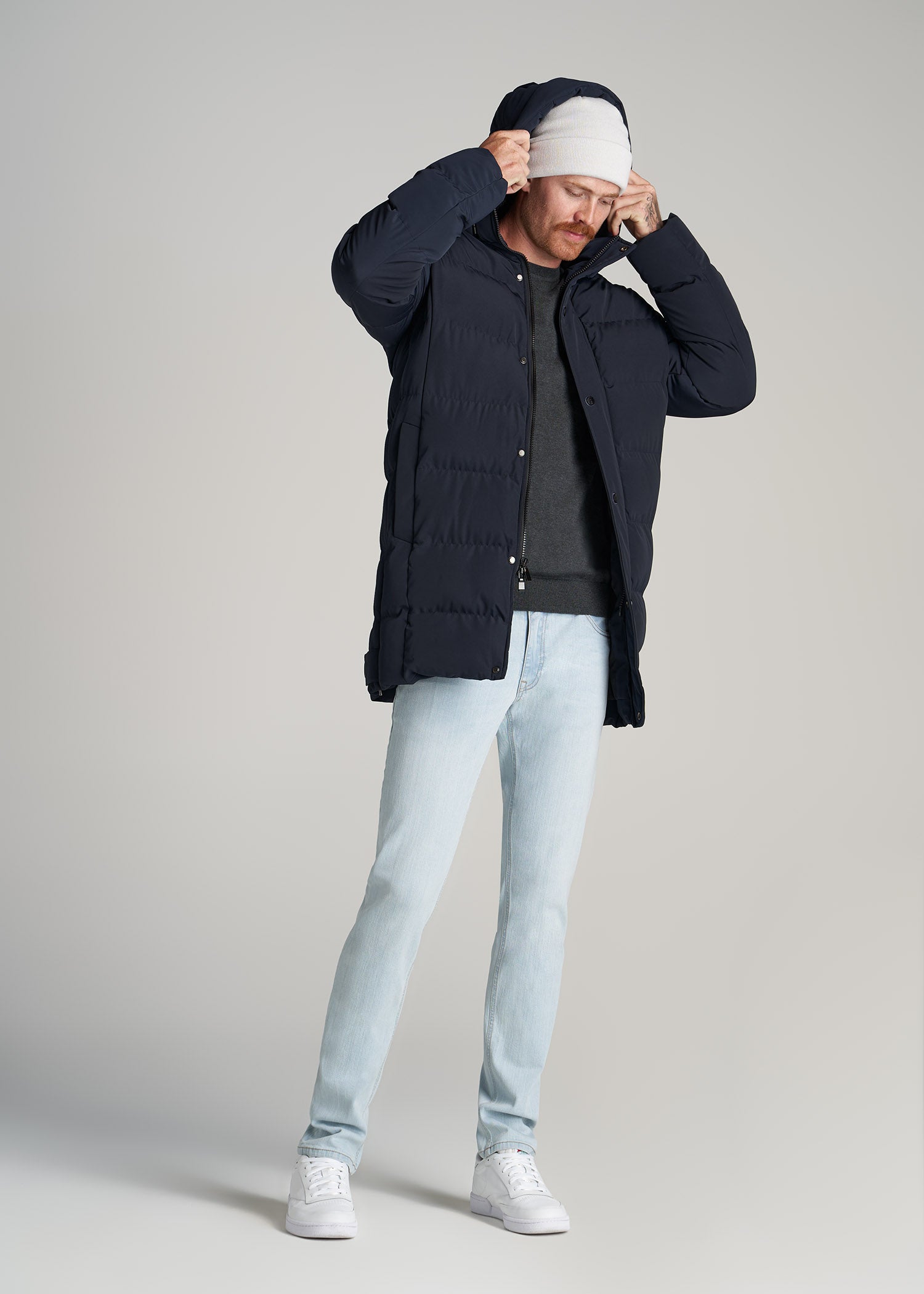 Tall man wearing American Tall X Point Zero Long Quilted Park in Navy