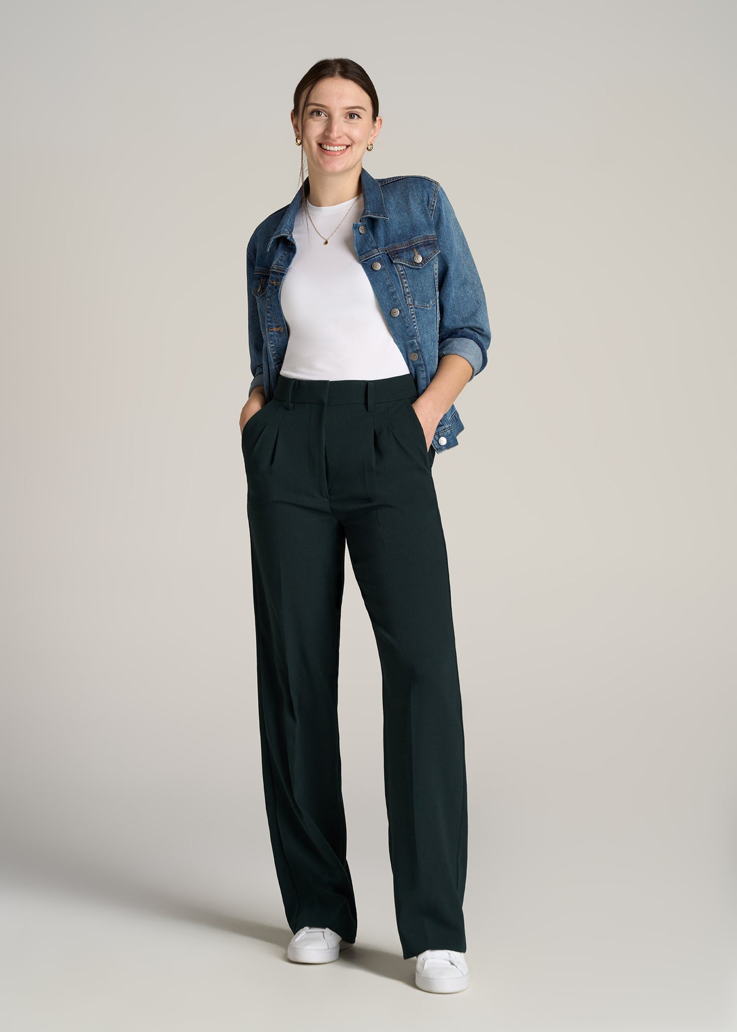 A tall woman wearing Pleated WIDE Leg Dress Pants for Tall Women in Midnight Green from American Tall