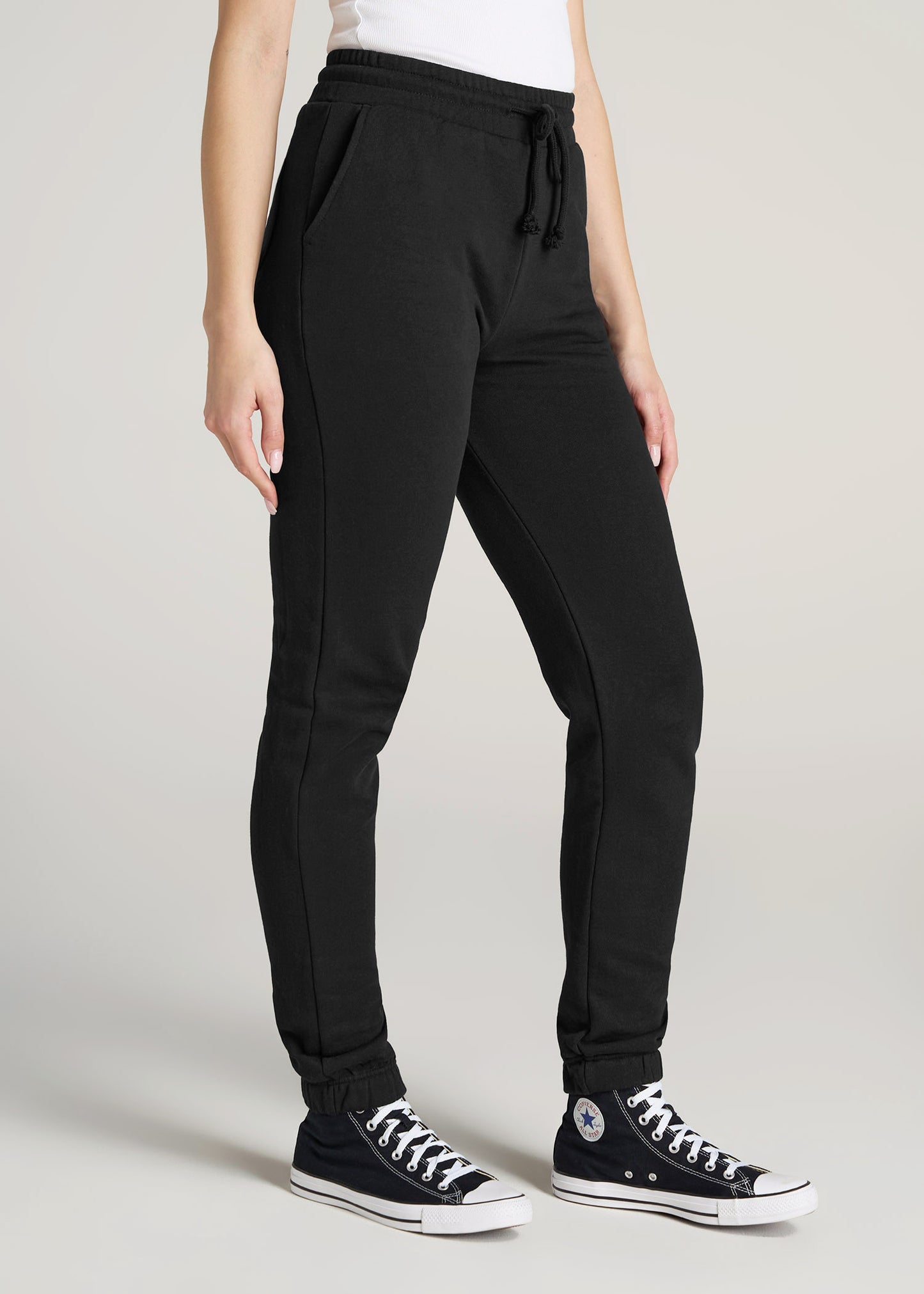 https://americantall.com/cdn/shop/products/American-Tall-Women-Wearever-SLIM-High-Waisted-Garment-Dye-Sweatpants-Black-side_1445x.jpg?v=1674666704